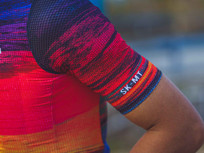 Monton URBAN Sunset Cycling Jersey with vibrant sunset-inspired colors, available in both men's and women's styles for stylish city cycling.