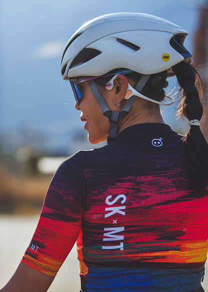 Monton URBAN Sunset Cycling Jersey with vibrant sunset-inspired colors, available in both men's and women's styles for stylish city cycling.