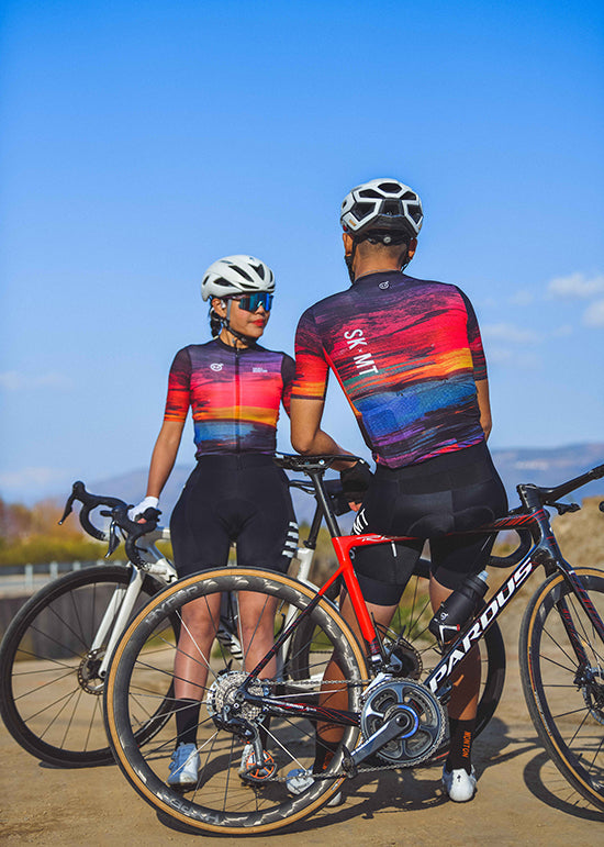 Monton URBAN Sunset Cycling Jersey with vibrant sunset-inspired colors, available in both men's and women's styles for stylish city cycling.