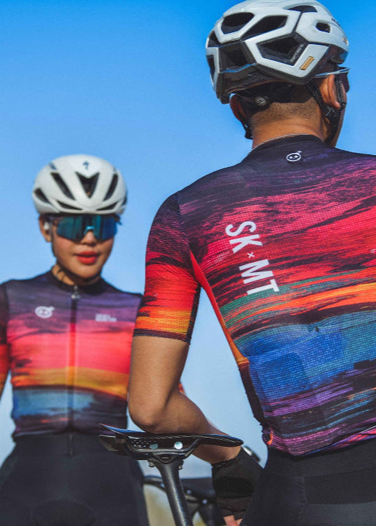 Monton URBAN Sunset Cycling Jersey with vibrant sunset-inspired colors, available in both men's and women's styles for stylish city cycling.